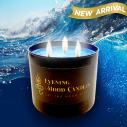 Elegant three-wick candle glowing against a vibrant ocean wave backdrop.